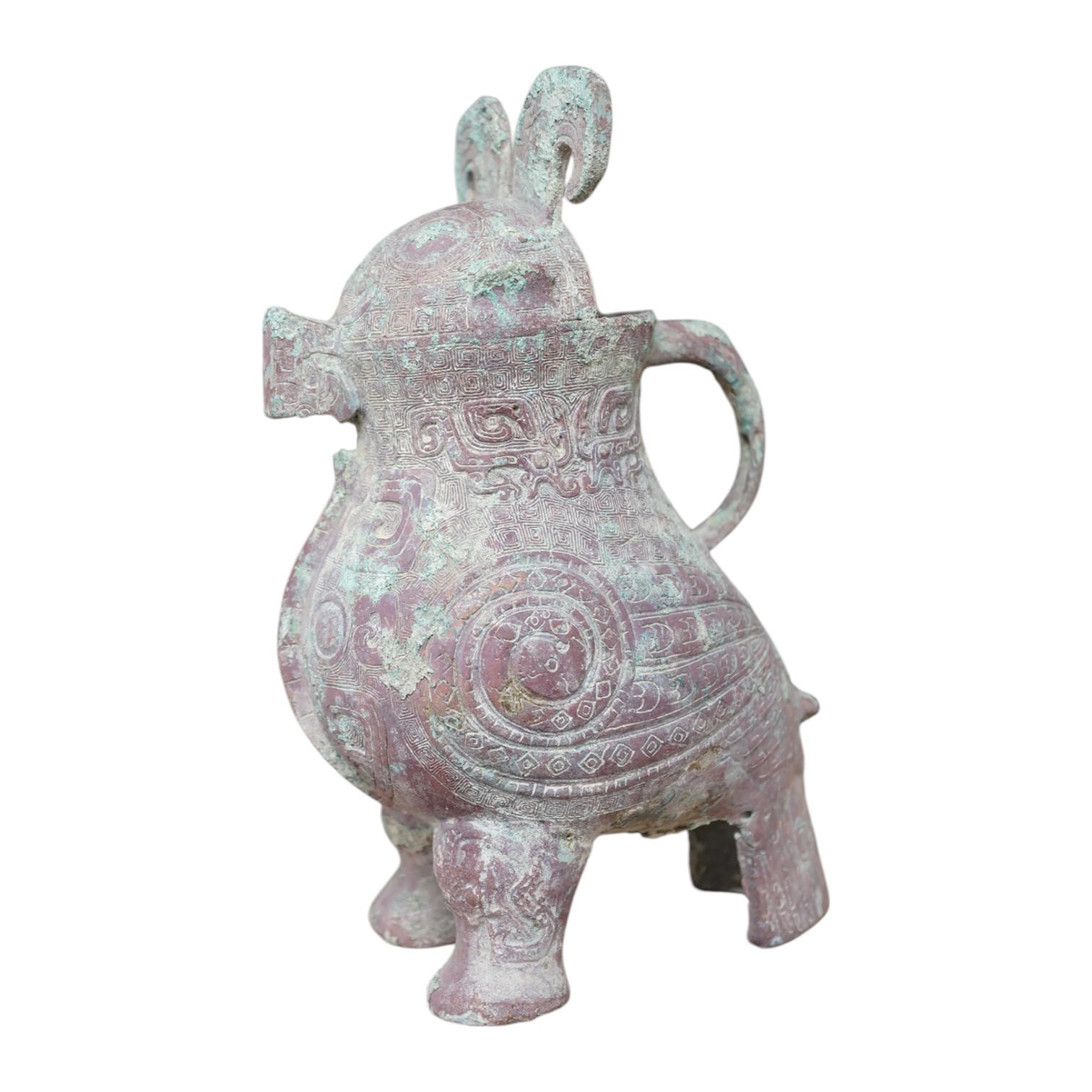 A Chinese archaistic bronze wine vessel, 22cm high. Condition - fair